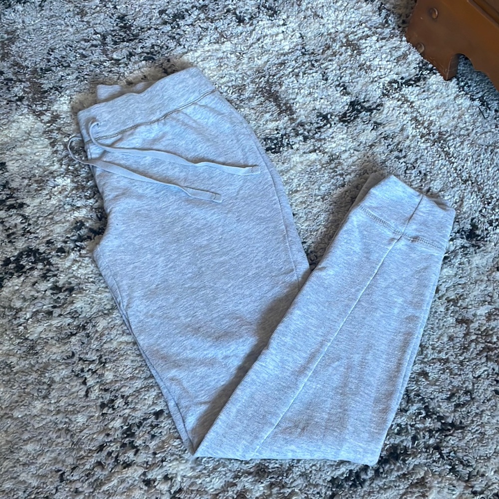 Light gray sweats.